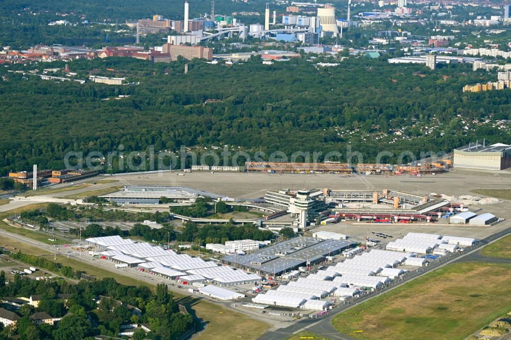 Berlin from above - Home and asylum accommodation tent camp as makeshift accommodation Ukraine Arrivals Center TXL in the district of Tegel in Berlin, Germany