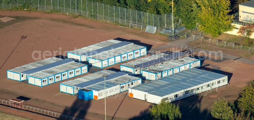 Aerial photograph Gladbeck - Container settlement as temporary shelter and reception center for refugees on the areal of Gesamtschule Rentfort in Gladbeck in the state North Rhine-Westphalia