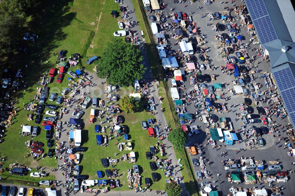 Erbach from above - Flohmarkt am Sportpark mit Pferderennbahn in Erbach im Odenwald / Hessen. Flea market at the Sports Park with horse racing track in Erbach im Odenwald, Hesse.