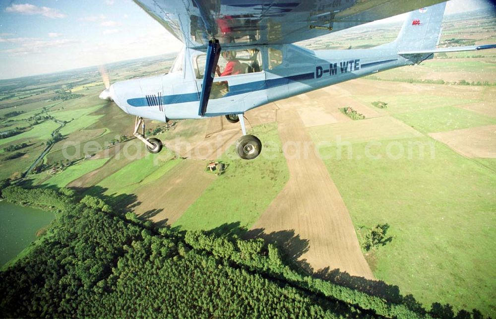 Aerial photograph Neuhardenberg / Brandenburg (ehem. Marxwalde) - Flug mit einem Ultraleichtflugzeug WT-02 in der Platzrunde des Flugplatzes Neuhardenberg (ehem. Marxwalde) im Bundesland Brandenburg.