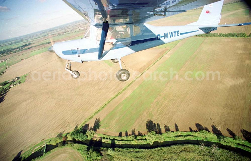 Aerial image Neuhardenberg / Brandenburg (ehem. Marxwalde) - Flug mit einem Ultraleichtflugzeug WT-02 in der Platzrunde des Flugplatzes Neuhardenberg (ehem. Marxwalde) im Bundesland Brandenburg.