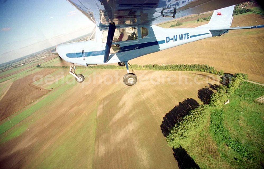 Aerial photograph Neuhardenberg / Brandenburg (ehem. Marxwalde) - Flug mit einem Ultraleichtflugzeug WT-02 in der Platzrunde des Flugplatzes Neuhardenberg (ehem. Marxwalde) im Bundesland Brandenburg.