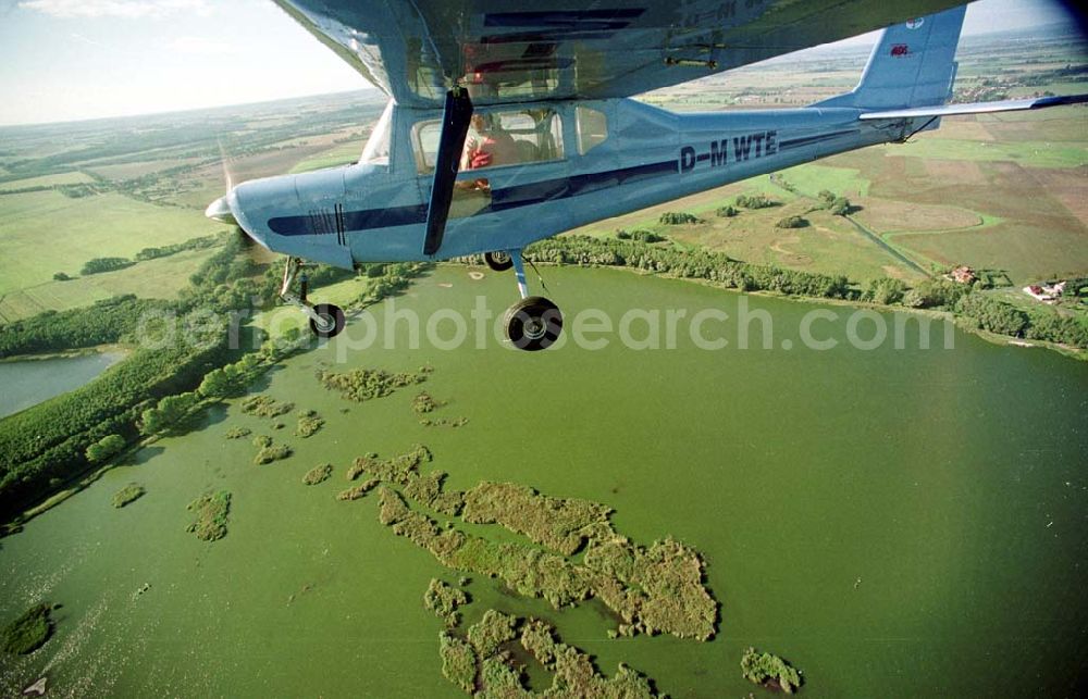 Neuhardenberg / Brandenburg (ehem. Marxwalde) from the bird's eye view: Flug mit einem Ultraleichtflugzeug WT-02 in der Platzrunde des Flugplatzes Neuhardenberg (ehem. Marxwalde) im Bundesland Brandenburg.