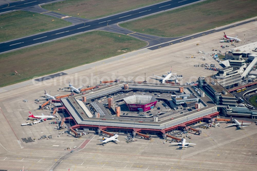 Berlin from above - Flight operations at the terminal of the airport Berlin - Tegel