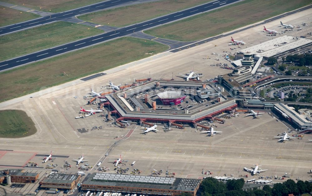 Berlin from the bird's eye view: Flight operations at the terminal of the airport Berlin - Tegel