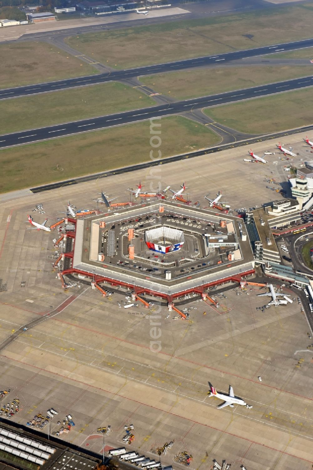 Berlin from above - Flight operations at the terminal of the airport Berlin - Tegel