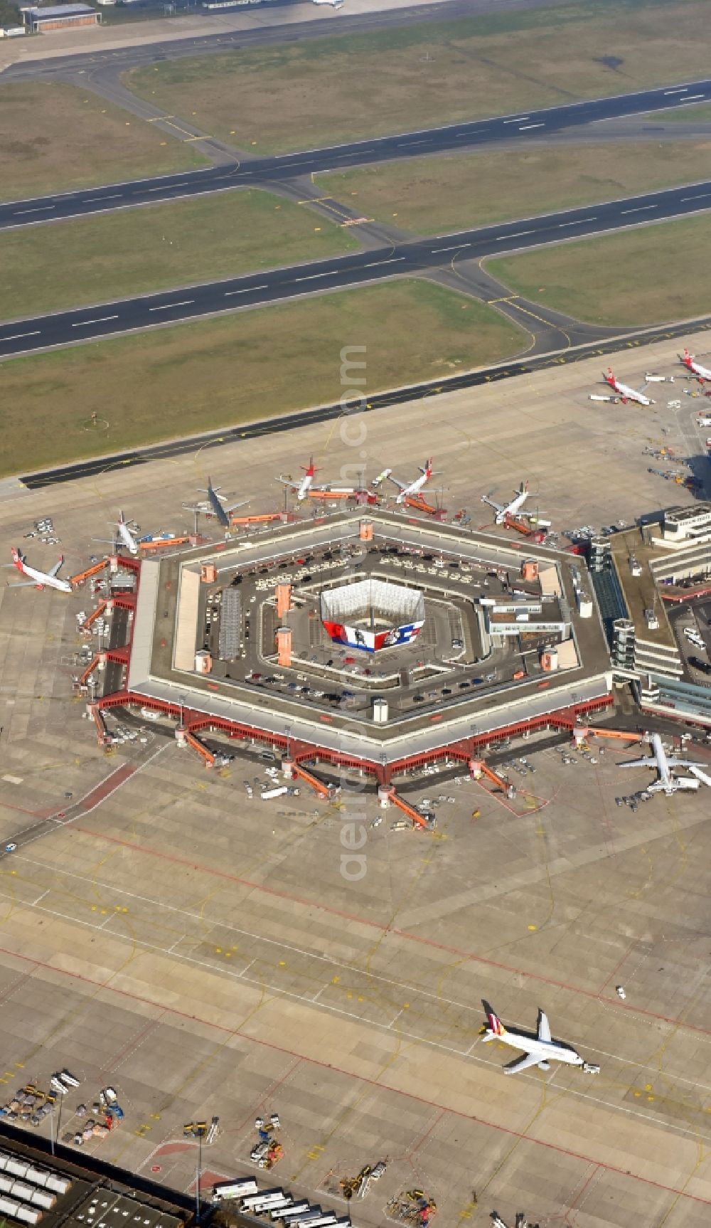 Berlin from the bird's eye view: Flight operations at the terminal of the airport Berlin - Tegel