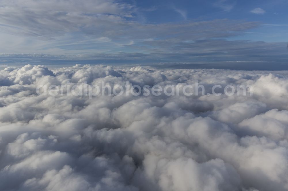 Neuenkirchen from the bird's eye view: Flight picture of the weather situation over the clouds in Neuenkirchen in North Rhine-Westphalia