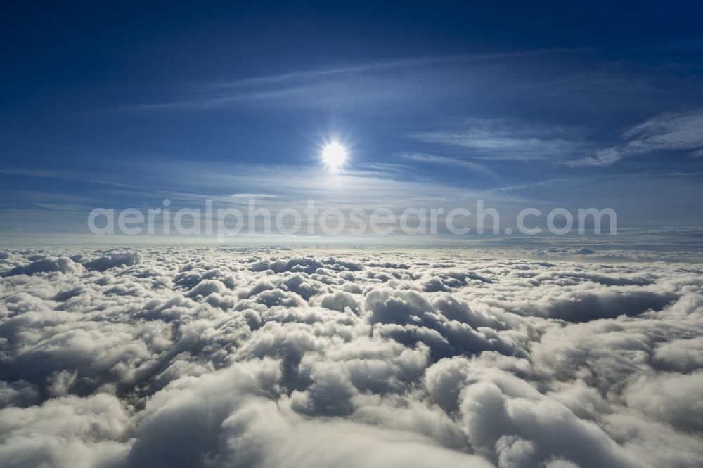 Neuenkirchen from the bird's eye view: Flight picture of the weather situation over the clouds in Neuenkirchen in North Rhine-Westphalia