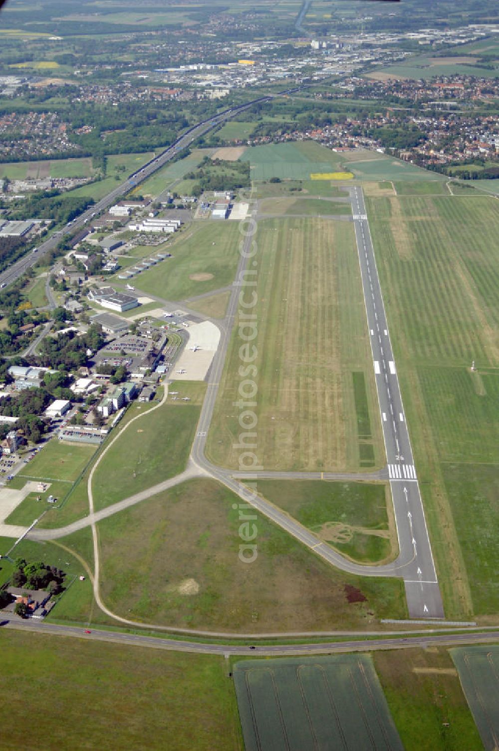 Braunschweig from the bird's eye view: Blick auf den Flughafen Braunschweig - Wolfsburg. Kontakt: Flughafen Braunschweig-Wolfsburg GmbH, Lilienthalplatz 5, 38108 Braunschweig, Tel. +49 (0) 531 354 40-0; Fax +49 (0) 531 354 40-45, E-Mail: info@flughafen-braunschweig-wolfsburg.de