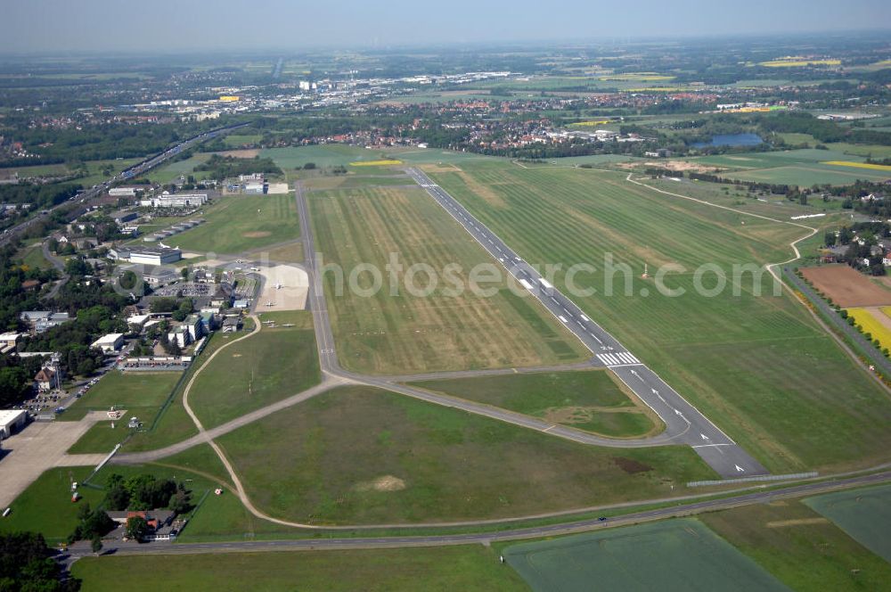 Braunschweig from the bird's eye view: Blick auf den Flughafen Braunschweig - Wolfsburg. Kontakt: Flughafen Braunschweig-Wolfsburg GmbH, Lilienthalplatz 5, 38108 Braunschweig, Tel. +49 (0) 531 354 40-0; Fax +49 (0) 531 354 40-45, E-Mail: info@flughafen-braunschweig-wolfsburg.de