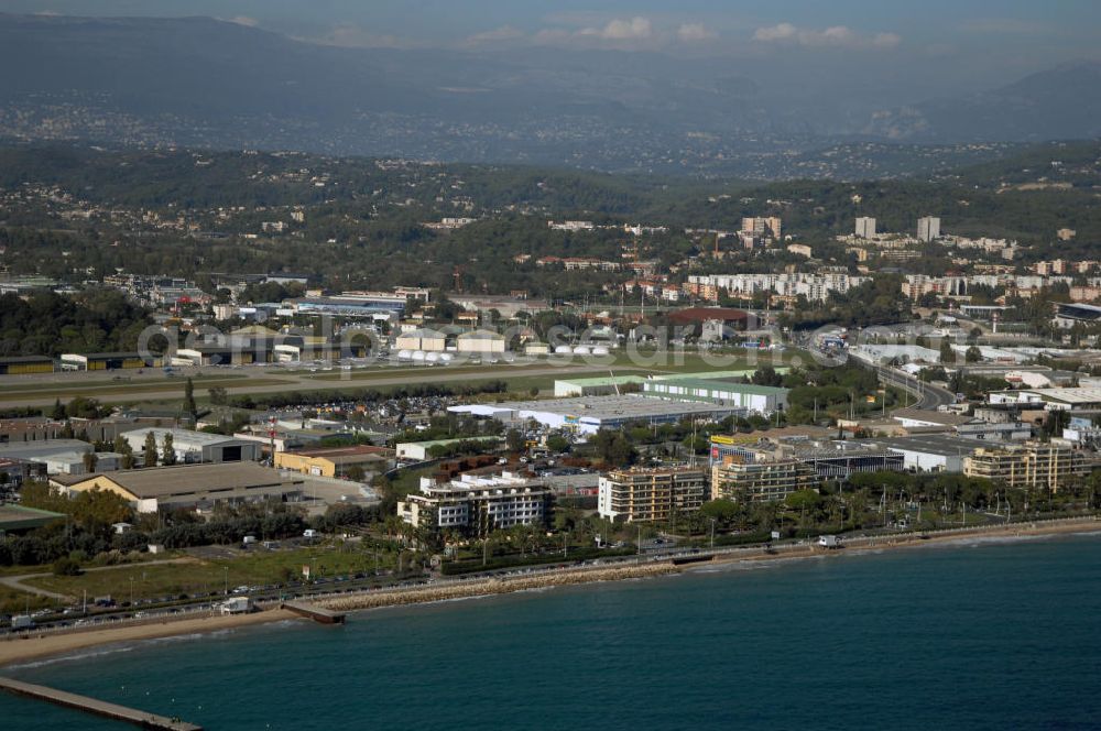 Aerial image Cannes - Blick auf den Flughafen Cannes - Mandelieu / Aéroport de Cannes - Mandelieu. Der Flughafen befindet sich ca 5km westlichen von Cannes, sowie östlich von Mandelieu la Napoule. International ist er weniger bedeutend, denn der Hauptflugverkehr wird im Flughafen von Nizza abgefertigt. Kontakt: Aéroport Cannes Mandelieu, Avenue Francis Tonner, 06150 Cannes, Tel. +33(0)8 20 42 66 66