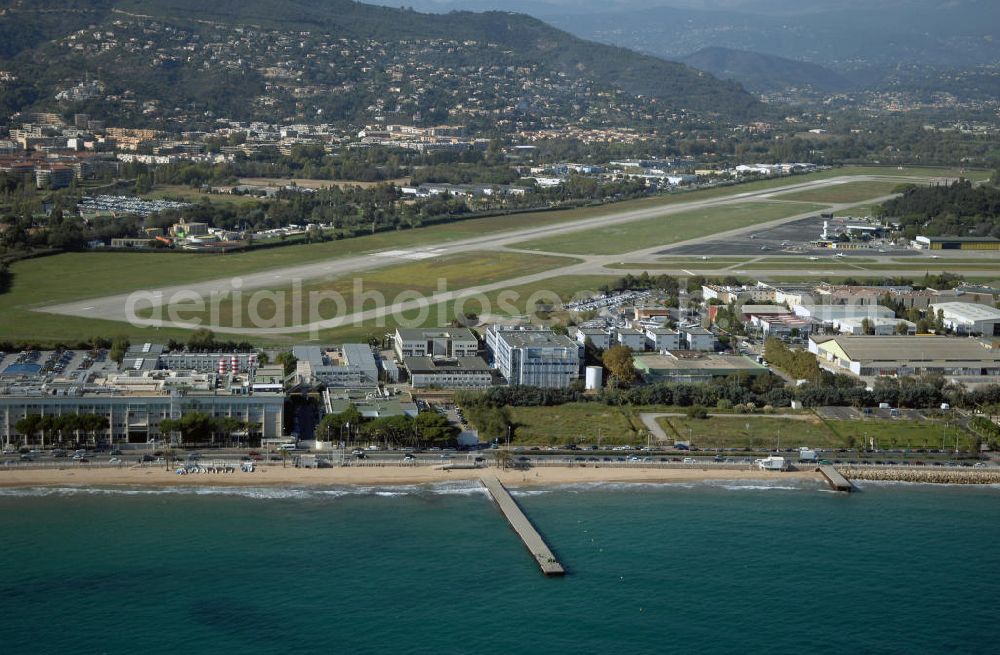 Aerial photograph Cannes - Blick auf den Flughafen Cannes - Mandelieu / Aéroport de Cannes - Mandelieu. Der Flughafen befindet sich ca 5km westlichen von Cannes, sowie östlich von Mandelieu la Napoule. International ist er weniger bedeutend, denn der Hauptflugverkehr wird im Flughafen von Nizza abgefertigt. Kontakt: Aéroport Cannes Mandelieu, Avenue Francis Tonner, 06150 Cannes, Tel. +33(0)8 20 42 66 66