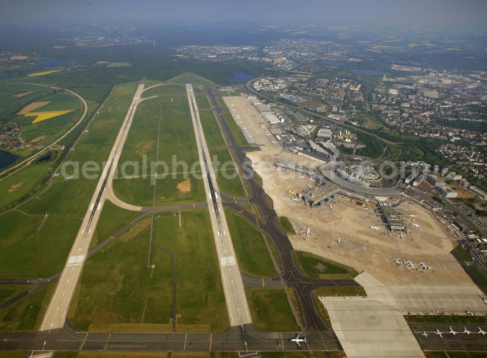 Aerial image - Blick auf den Flughafen Düsseldorf International. Dieser ist der zentrale Flughafen von Nordrhein-Westfalen. View to the Duesseldorf International Airport which is the main airport in Nothrhine Westfalia.