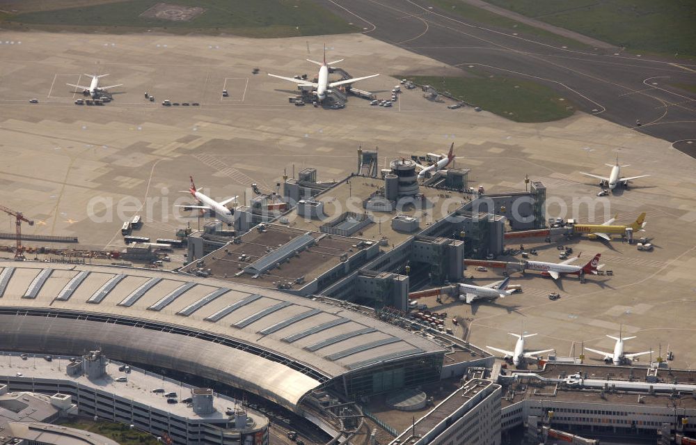 Aerial photograph - Blick auf den Flughafen Düsseldorf International. Dieser ist der zentrale Flughafen von Nordrhein-Westfalen. View to the Duesseldorf International Airport which is the main airport in Nothrhine Westfalia.