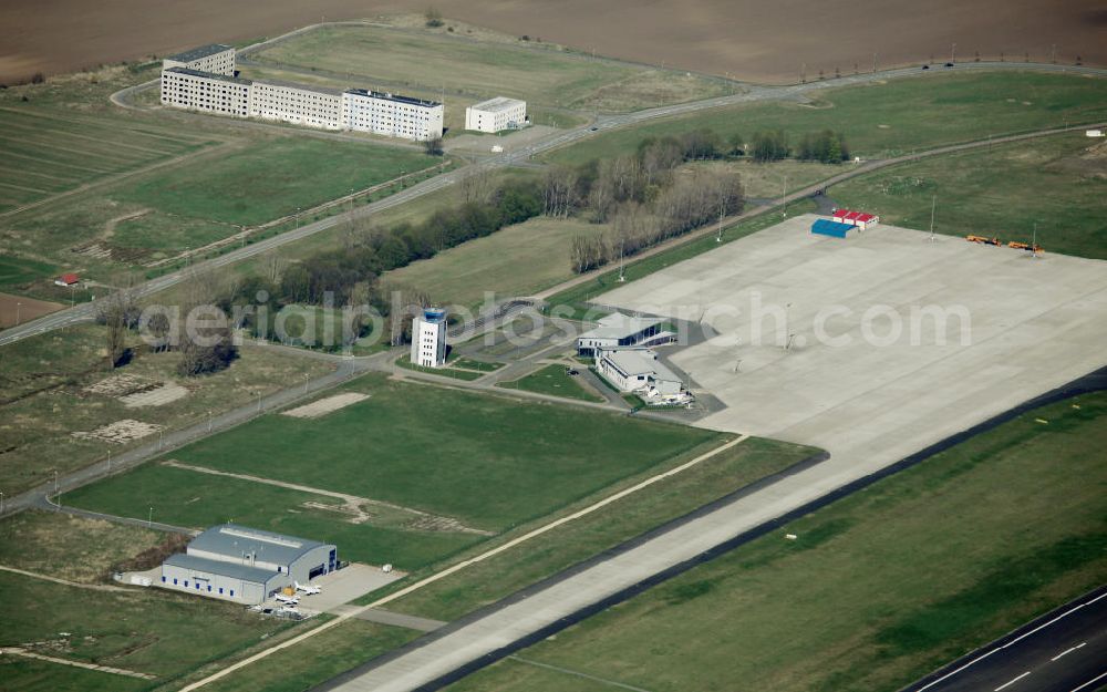 Cochstedt from the bird's eye view: Der Flughafen Magdeburg-Cochstedt an der Harzstraße in der Nähe von Cochstedt in Sachsen-Anhalt. The airport Magdeburg-Cochstedt at the street Harzstrasse near Cochstedt in Saxony-Anhalt.