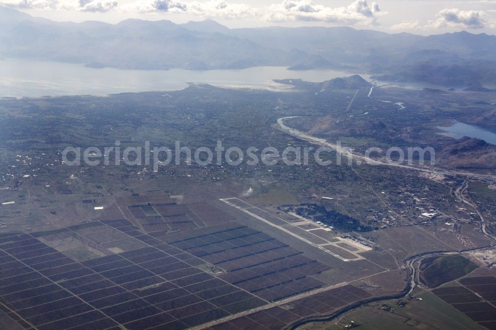 Podgorica from the bird's eye view: Agricultural fields and land at the airport in Podgorica, formerly Titograd, now the capital of Montenegro