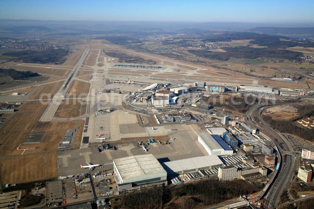 Aerial photograph Zürich - Gesamtansicht vom Flughafen Zürich-Kloten. Blick nach Norden in Richtung Piste 34. General view from the grounds of the airport Zurich-Kloten.