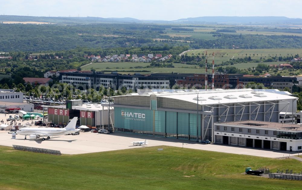 Erfurt from the bird's eye view: Runway with hangar taxiways and terminals on the grounds of the airport in Erfurt in the state Thuringia