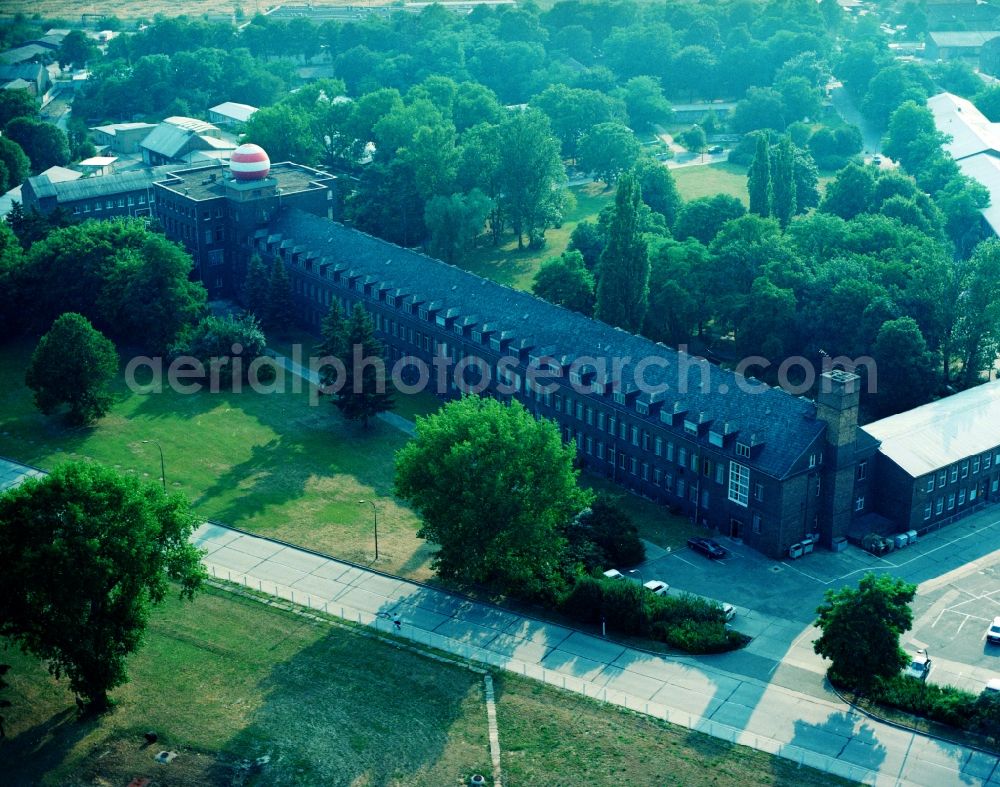 Aerial photograph Schönefeld - Airport road to the building complex of the former main INTERFLUG- and Civil Aviation Administration of the GDR German Democratic Republic in Schoenefeld in Brandenburg