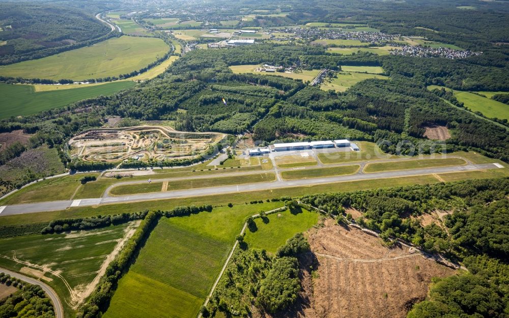 Arnsberg from the bird's eye view: Runway with tarmac terrain of airfield Menden in Arnsberg in the state North Rhine-Westphalia, Germany