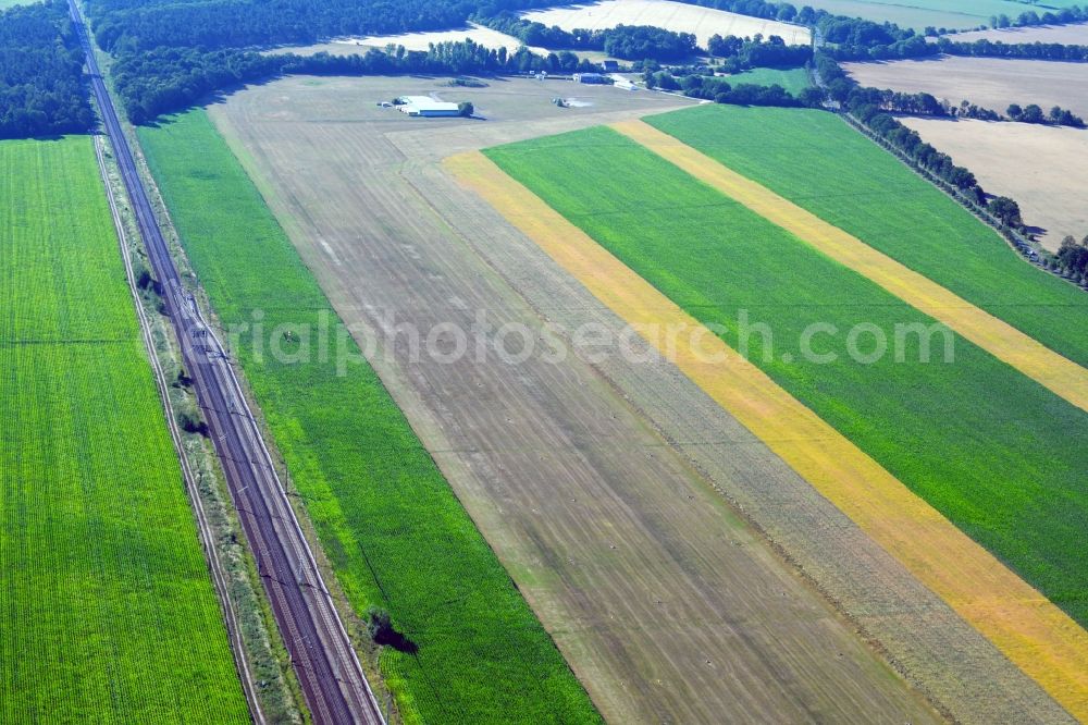 Selbelang from above - Runway with tarmac terrain of airfield Bienenfarm GmbH in Selbelang in the state Brandenburg, Germany