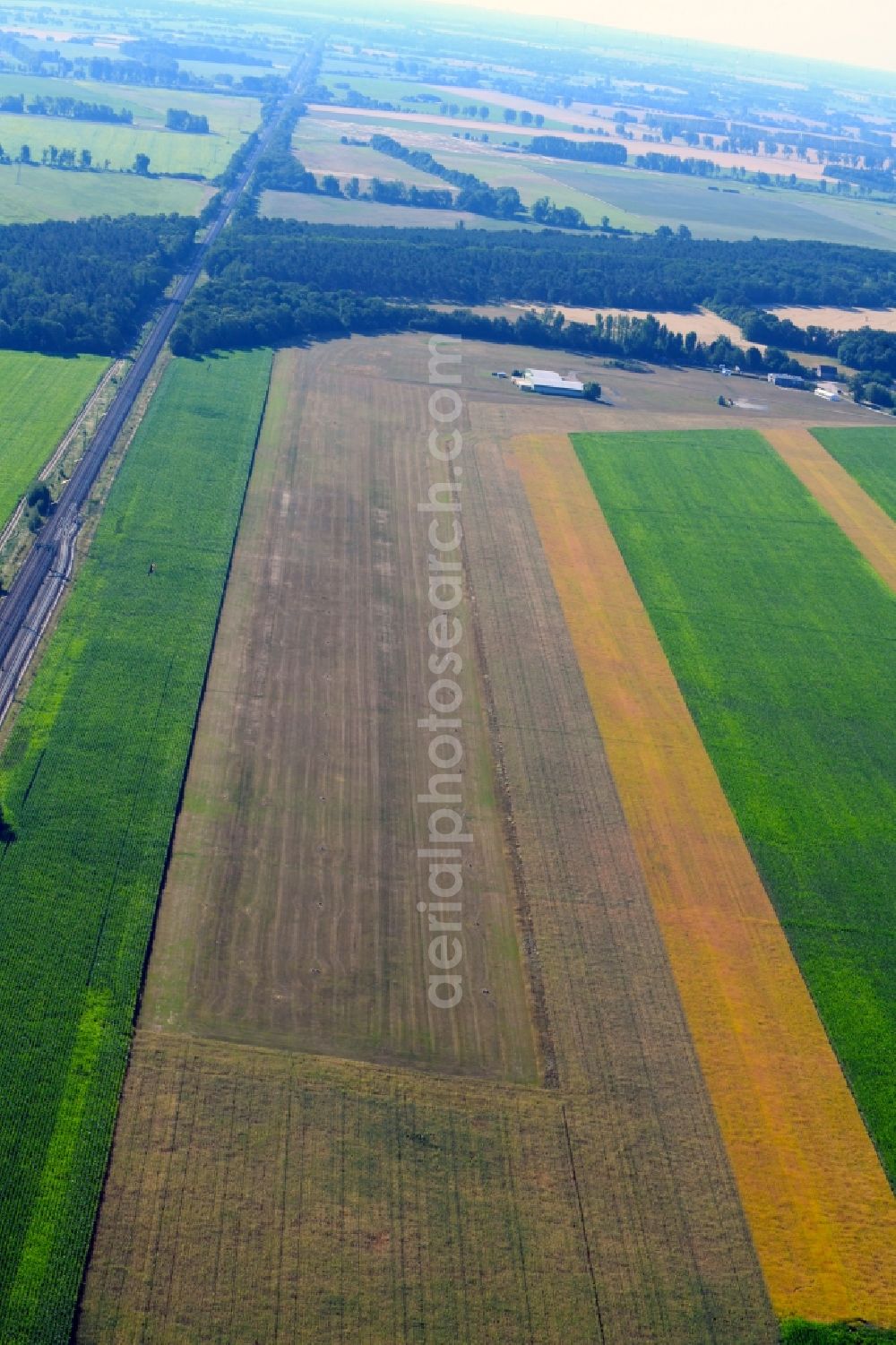 Aerial image Selbelang - Runway with tarmac terrain of airfield Bienenfarm GmbH in Selbelang in the state Brandenburg, Germany