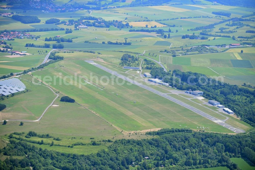 Bindlach from the bird's eye view: Runway with tarmac terrain of airfield Airport Bayreuth on Flugplatzstrasse in Bindlach in the state Bavaria, Germany