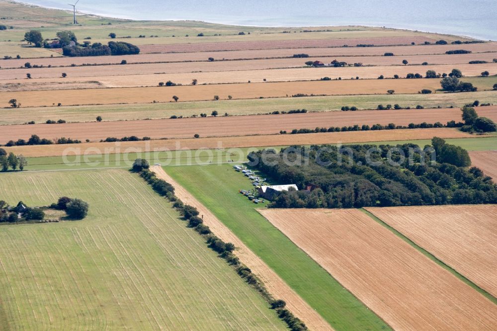 Aerial image Endelave - Runway with tarmac terrain of airfield on the island of Endelave in Denmark