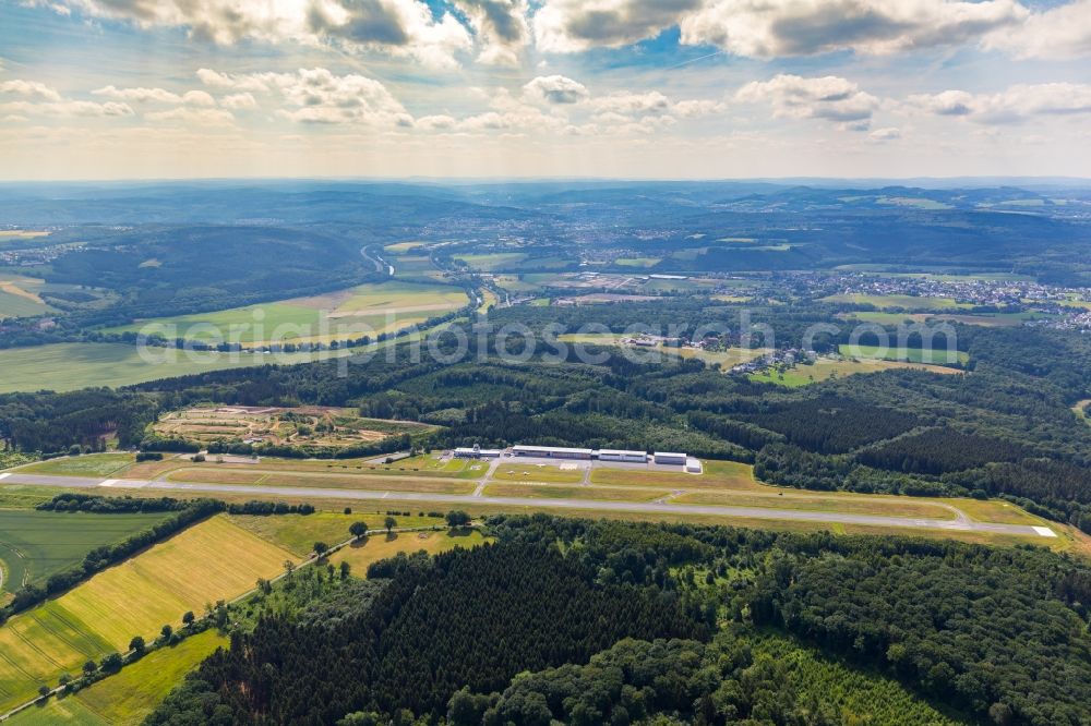 Wickede (Ruhr) from the bird's eye view: Runway with tarmac terrain of airfield FAM Airport Arnsberg Menden in Wickede (Ruhr) in the state North Rhine-Westphalia, Germany