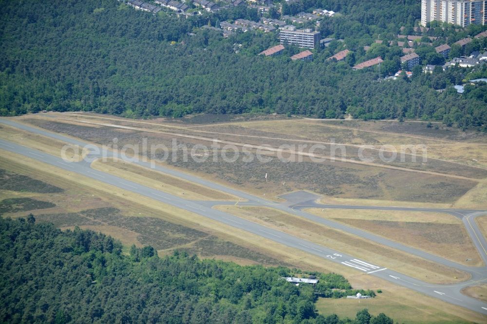 Bielefeld from above - Runway with tarmac terrain of airfield Flughafen Bielefeld GmbH in Bielefeld in the state North Rhine-Westphalia