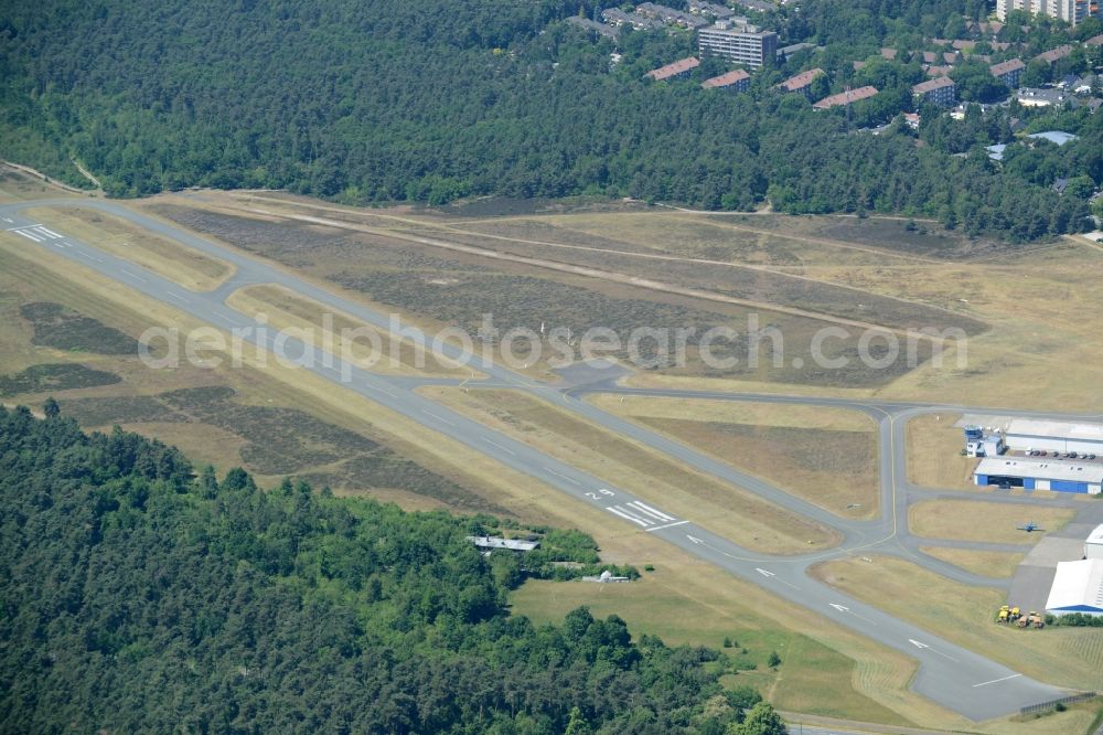 Bielefeld from the bird's eye view: Runway with tarmac terrain of airfield Flughafen Bielefeld GmbH in Bielefeld in the state North Rhine-Westphalia