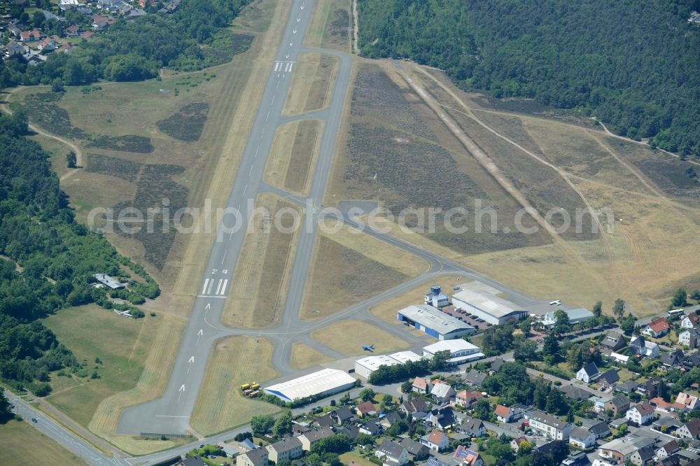 Aerial photograph Bielefeld - Runway with tarmac terrain of airfield Flughafen Bielefeld GmbH in Bielefeld in the state North Rhine-Westphalia