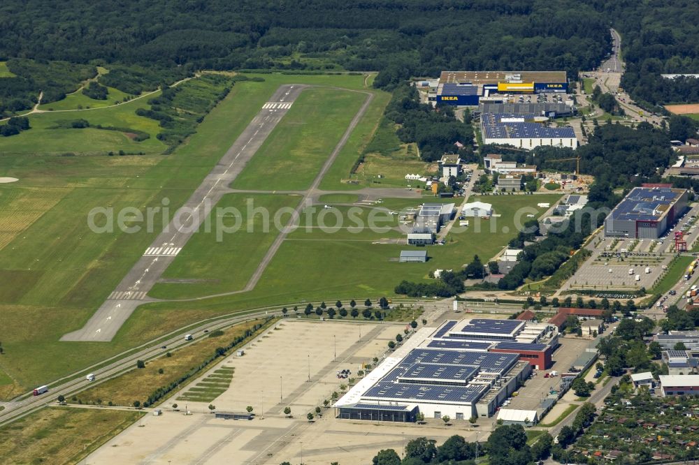 Freiburg im Breisgau from the bird's eye view: Runway with tarmac terrain of airfield in Freiburg im Breisgau in the state Baden-Wuerttemberg, Germany