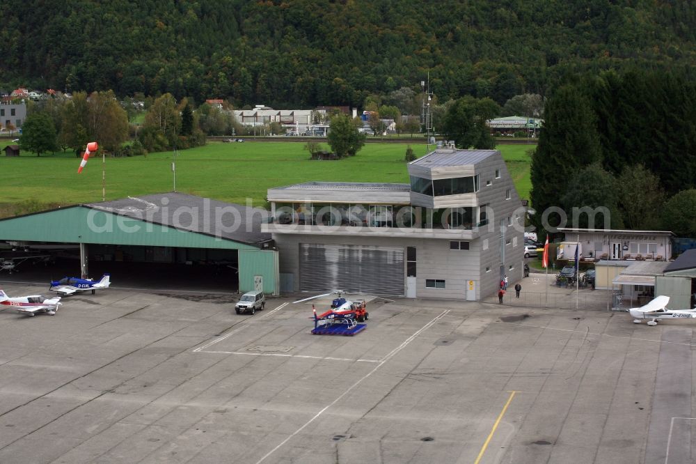 Hohenems from the bird's eye view: Tarmac Terrain, Apron and control tower of airfield Hohenems-Dornbirn in Hohenems in Vorarlberg, Austria