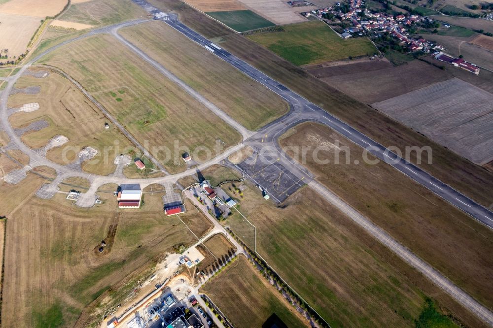 Aerial image Juvaincourt - Runway with tarmac terrain of airfield Aeroport d'Epinal - Mirecourt in Juvaincourt in Grand Est, France