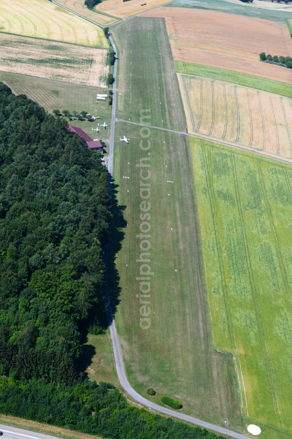 Möckmühl from above - Runway with tarmac terrain of airfield in Moeckmuehl in the state Baden-Wurttemberg, Germany