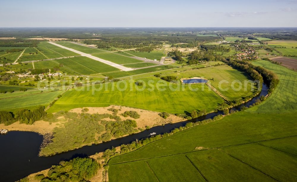 Lärz from the bird's eye view: Grounds of Mueritz Airpark in Laerz in Mecklenburg - Western Pomerania. The former military airfield, the airfield Rechlin is used for civilian today