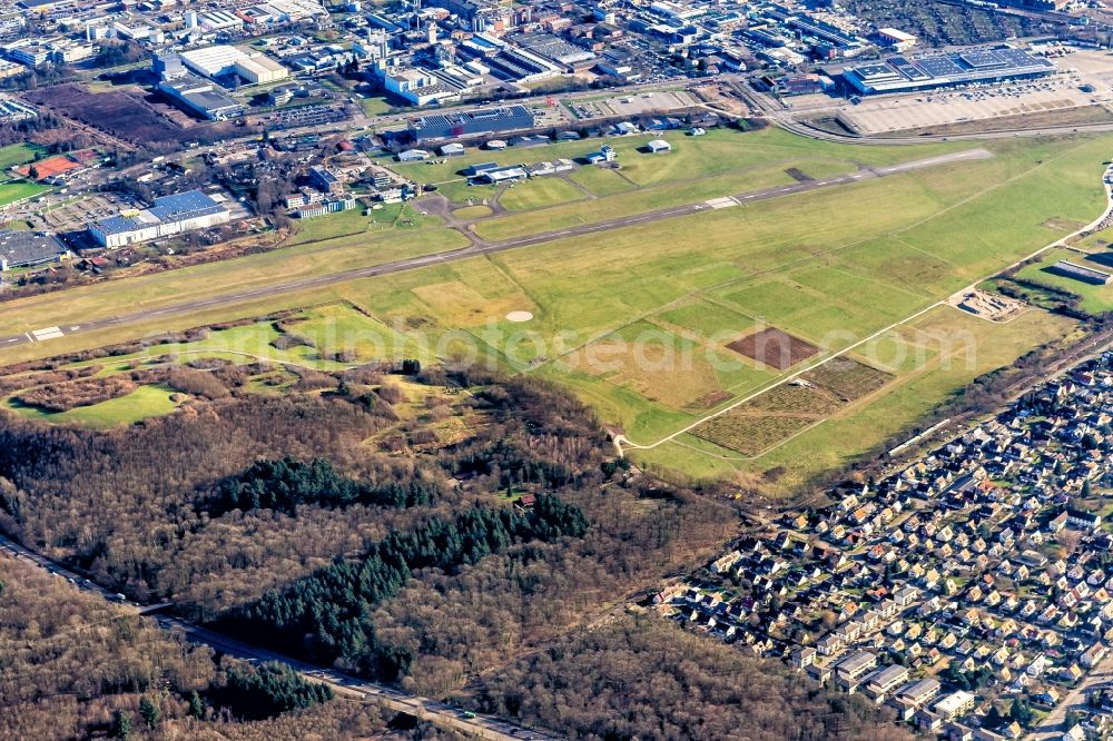 Freiburg im Breisgau from the bird's eye view: Runway with tarmac terrain of airfield in the district Bruehl in Freiburg im Breisgau in the state Baden-Wurttemberg, Germany