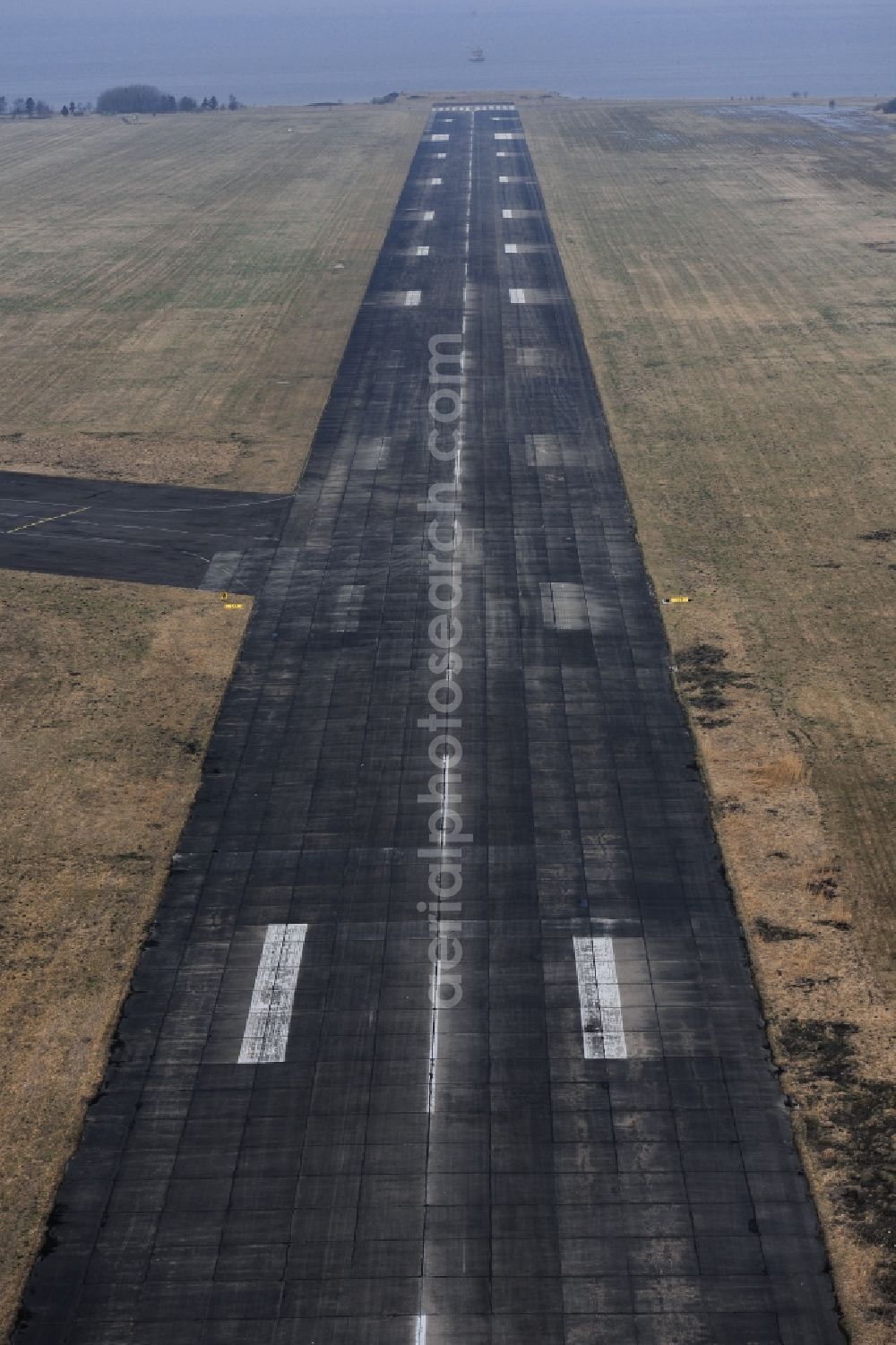 Aerial image Peenemünde - Runway with tarmac terrain of airfield in Peenemuende in the state Mecklenburg - Western Pomerania, Germany