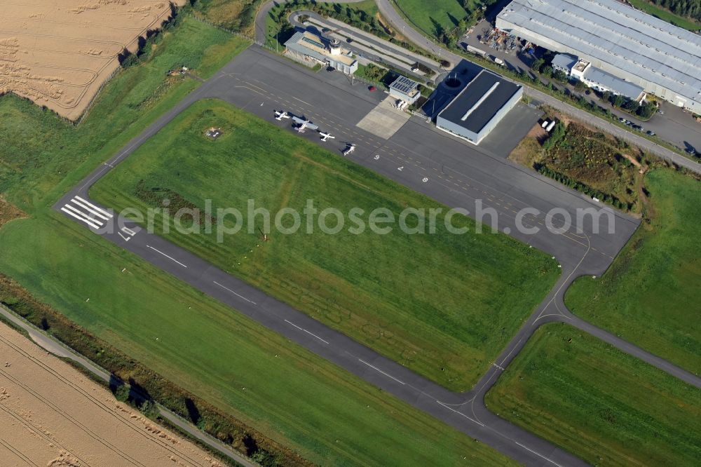 Jahnsdorf Erzgebirge from the bird's eye view: Runway with tarmac terrain of airfield Verkehrslandeplatz Chemnitz/ Jahnsdorf GmbH on Wilhermsdorfer Strasse in Jahnsdorf Erzgebirge in the state Saxony