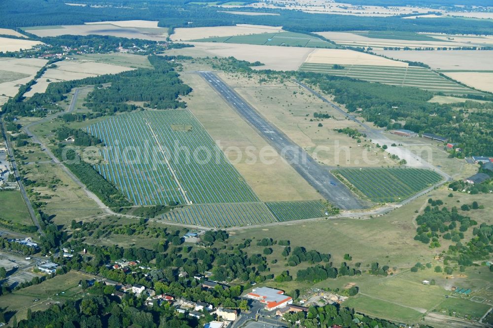 Werneuchen from above - Runway with tarmac terrain of airfield in Werneuchen in the state Brandenburg, Germany