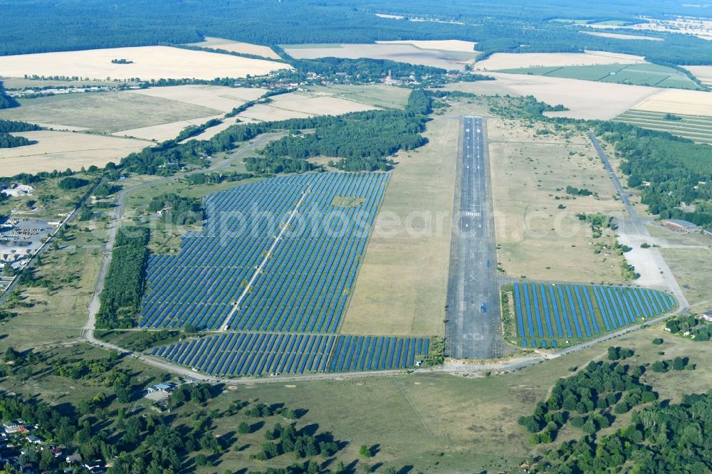 Werneuchen from the bird's eye view: Runway with tarmac terrain of airfield in Werneuchen in the state Brandenburg, Germany