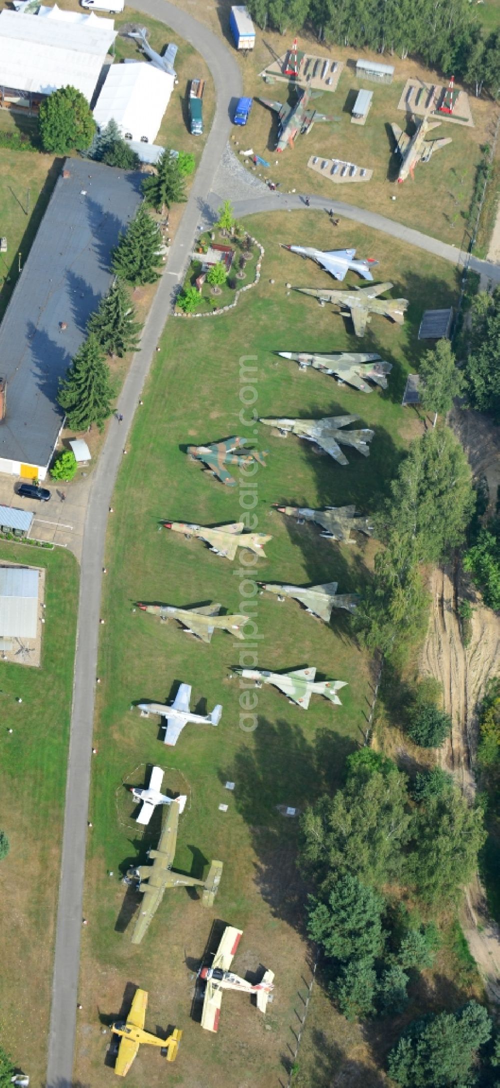 Aerial photograph Cottbus - View of the Airfield Museum on the site of the former airfield Cottbus. Covering an area of 20,000 square meters military aircrafts, agricultural aircraft and helicopters and also air traffic control and vehicle technology from the history of aviation are shown. All periods are presented in detail in the museum's images and documents