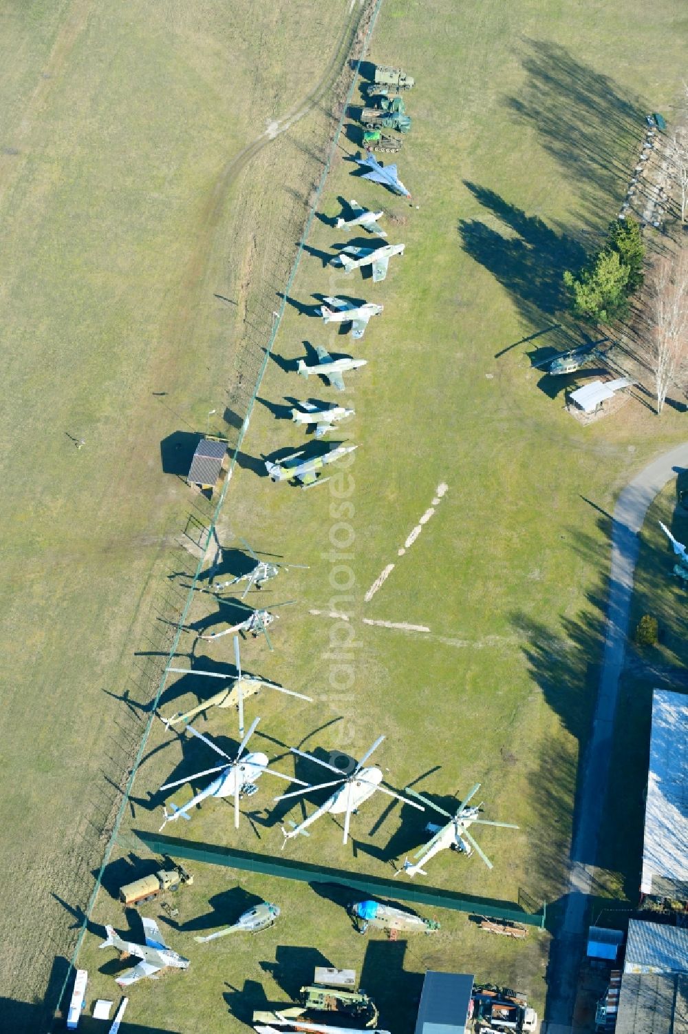 Aerial photograph Cottbus - View of the Airfield Museum on the site of the former airfield Cottbus. Covering an area with military aircrafts, agricultural aircraft and helicopters and also air traffic control and vehicle technology from the history of aviation are shown. All periods are presented in detail in the museum's images and documents