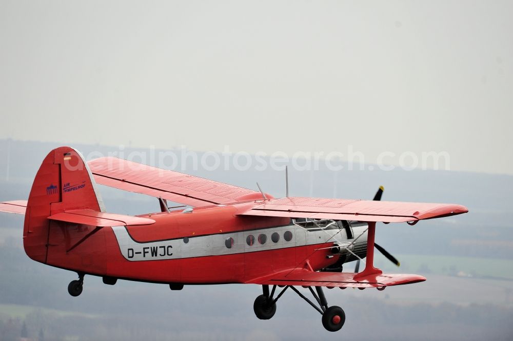 Aerial image Melchow - Antonow AN-2 with of Kennung D-FWJC Aircraft in flight over the airspace in Melchow in the state Brandenburg, Germany