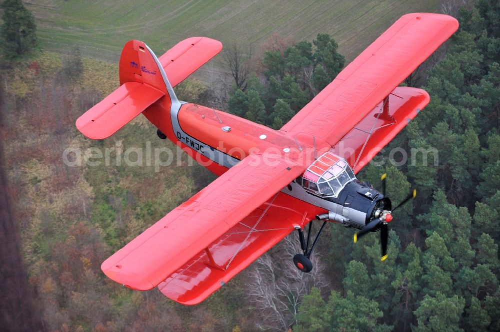 Aerial image Melchow - Antonow AN-2 with of Kennung D-FWJC Aircraft in flight over the airspace in Melchow in the state Brandenburg, Germany