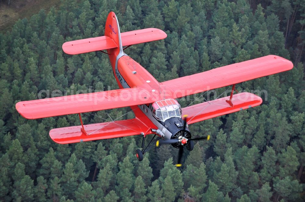 Melchow from above - Antonow AN-2 with of Kennung D-FWJC Aircraft in flight over the airspace in Melchow in the state Brandenburg, Germany