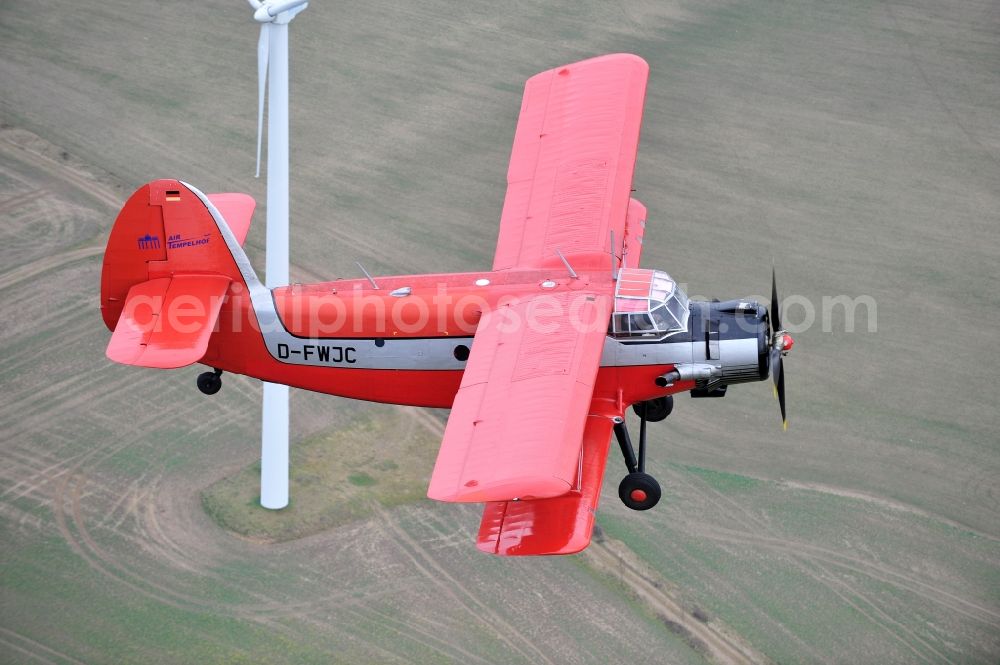 Aerial image Melchow - Antonow AN-2 with of Kennung D-FWJC Aircraft in flight over the airspace in Melchow in the state Brandenburg, Germany