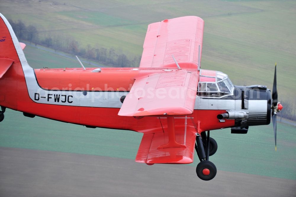 Aerial image Melchow - Antonow AN-2 with of Kennung D-FWJC Aircraft in flight over the airspace in Melchow in the state Brandenburg, Germany